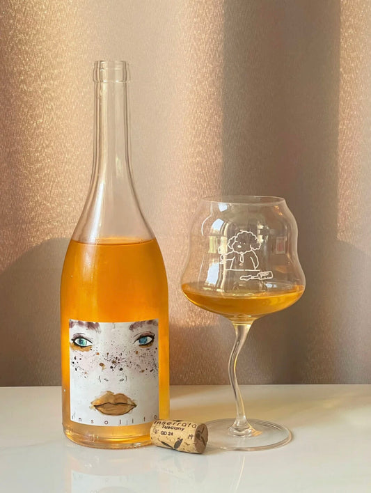 Orange Wine: Svelando l'Intrigante Elisir delle Antiche Tradizioni Vinicole